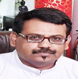 Portrait photo of Swami Aaron with glasses and mustache